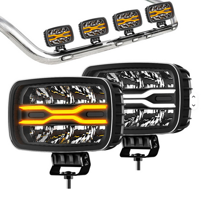Zwei superhelle 10-Zoll-24-Volt-LED Scheinwerfer von SimpleRick mit Bernsteinfarbenem Positionslicht, geeignet für Scania V8 Lkw.